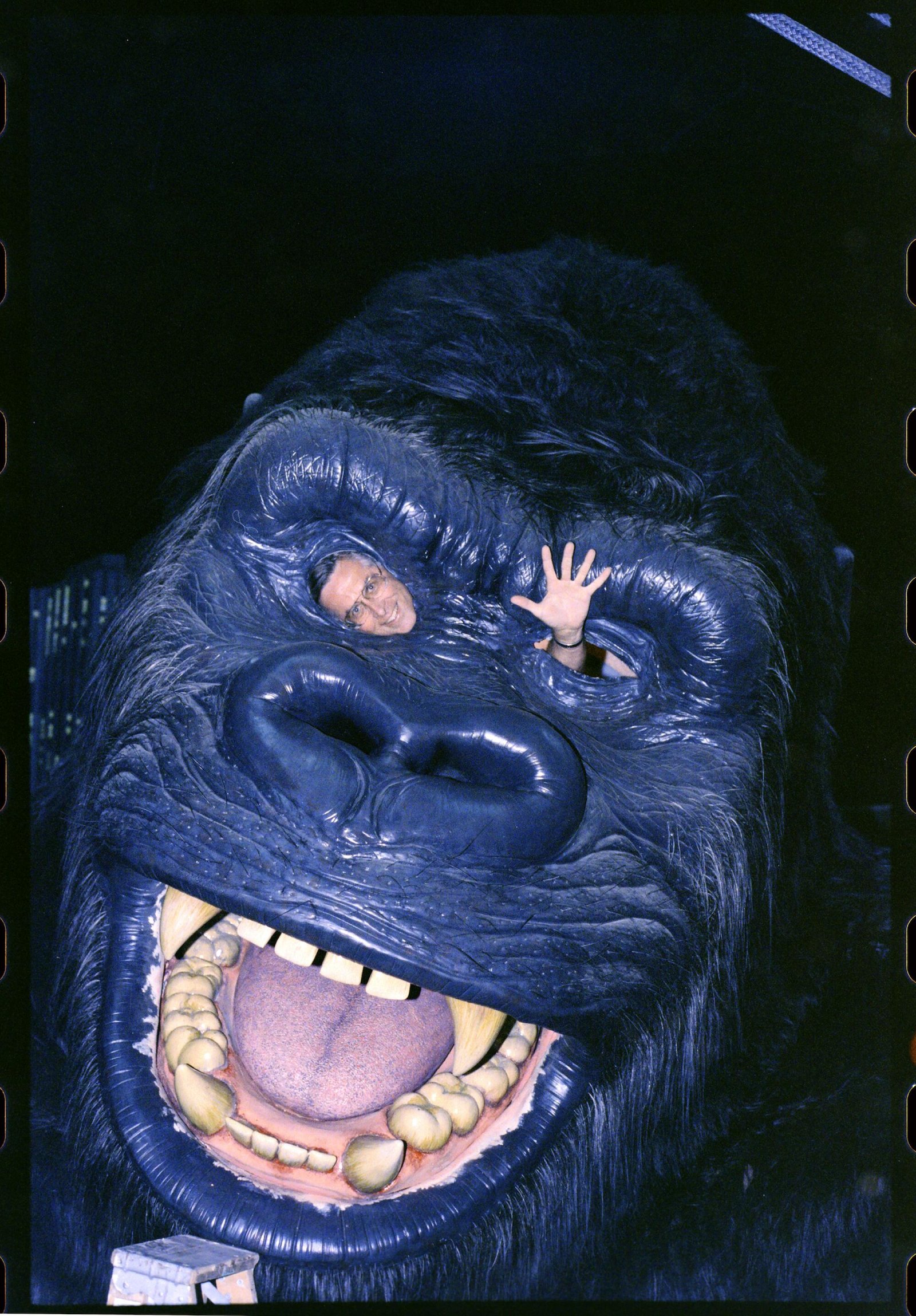 A man hidden in the eye of King Kong. 