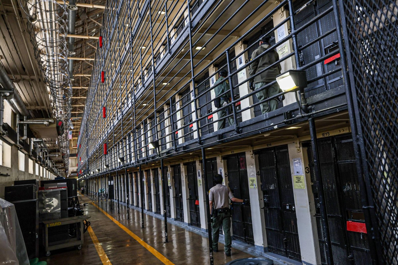 Narrow prison cells are stacked five stories high on San Quentin's death row. 