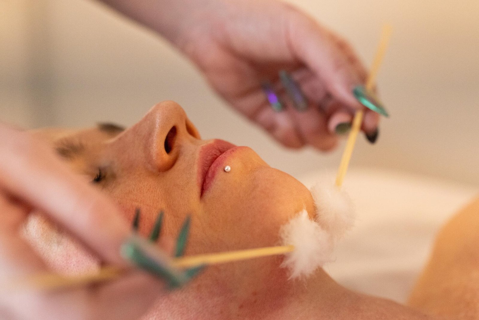 A table of tools that ASMR masseuse and content creator Julie Luther uses during her sessions.