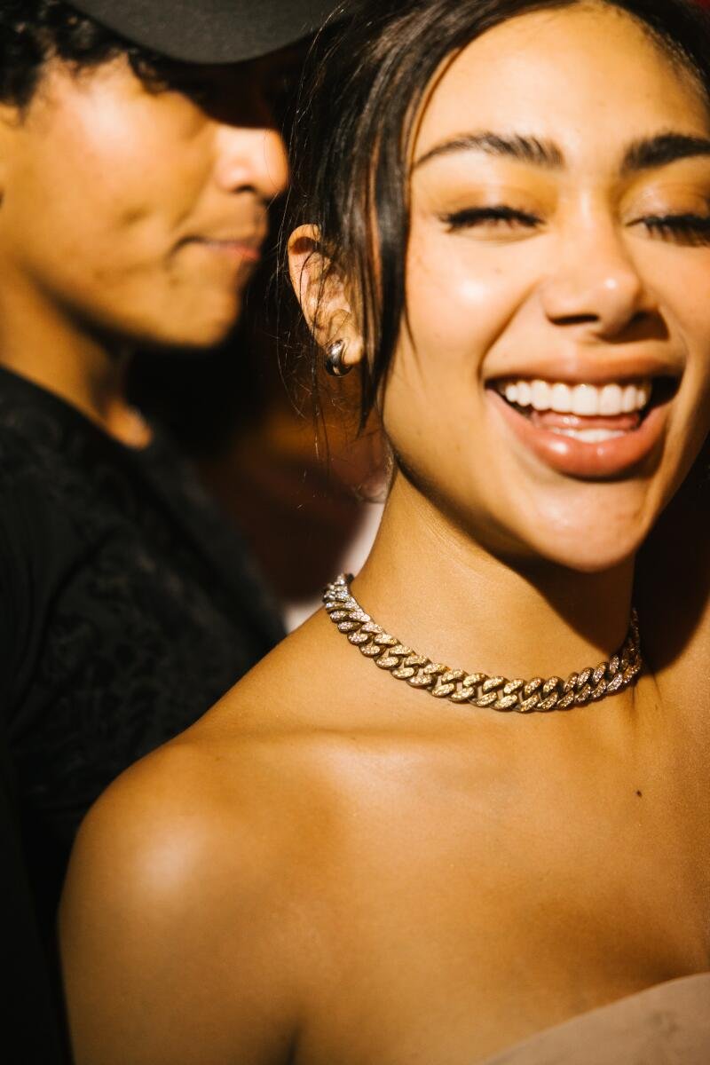 An audience member dances at Los Guitarrazos