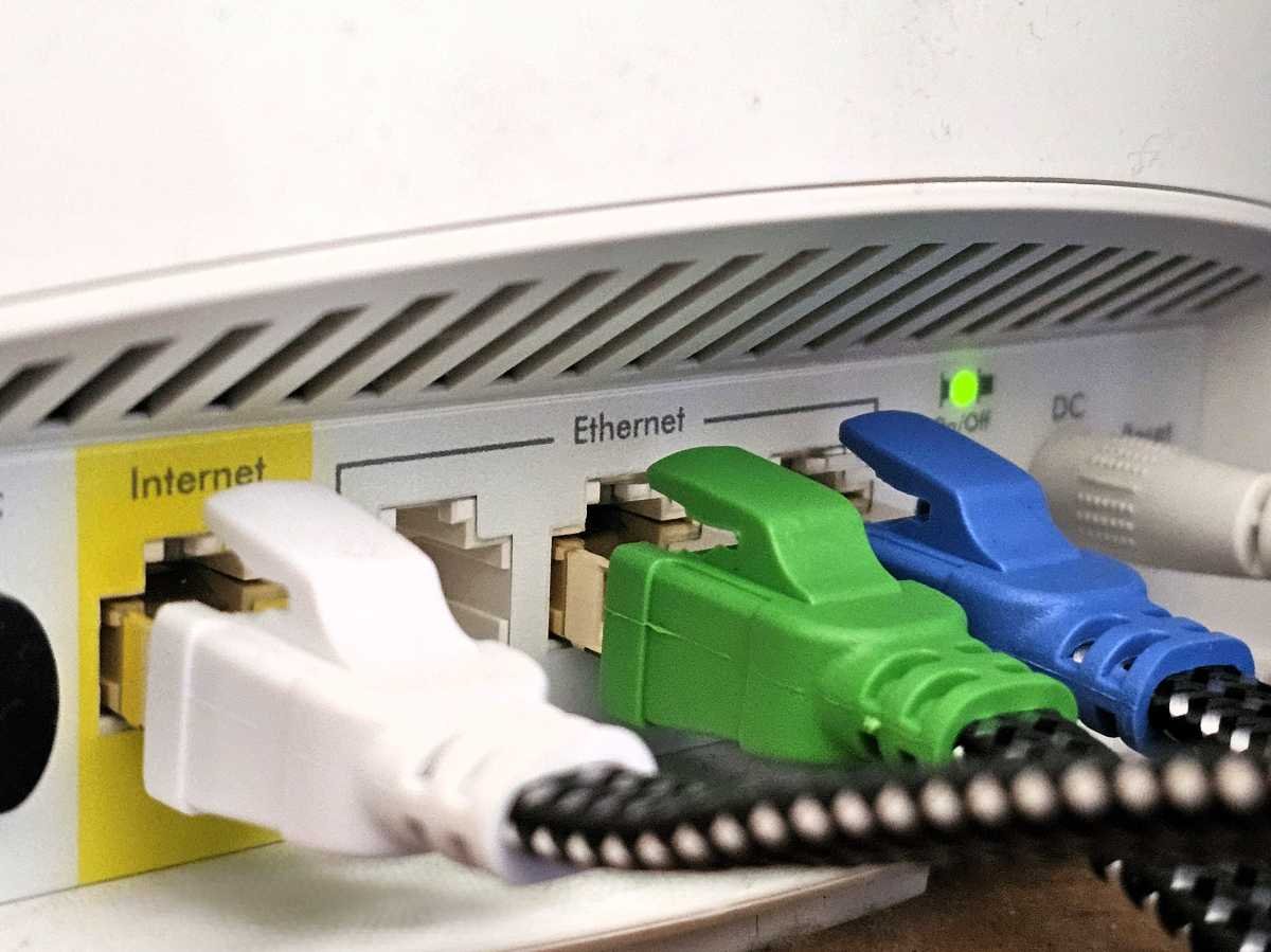 Cat8 Ethernet cables connected to a router