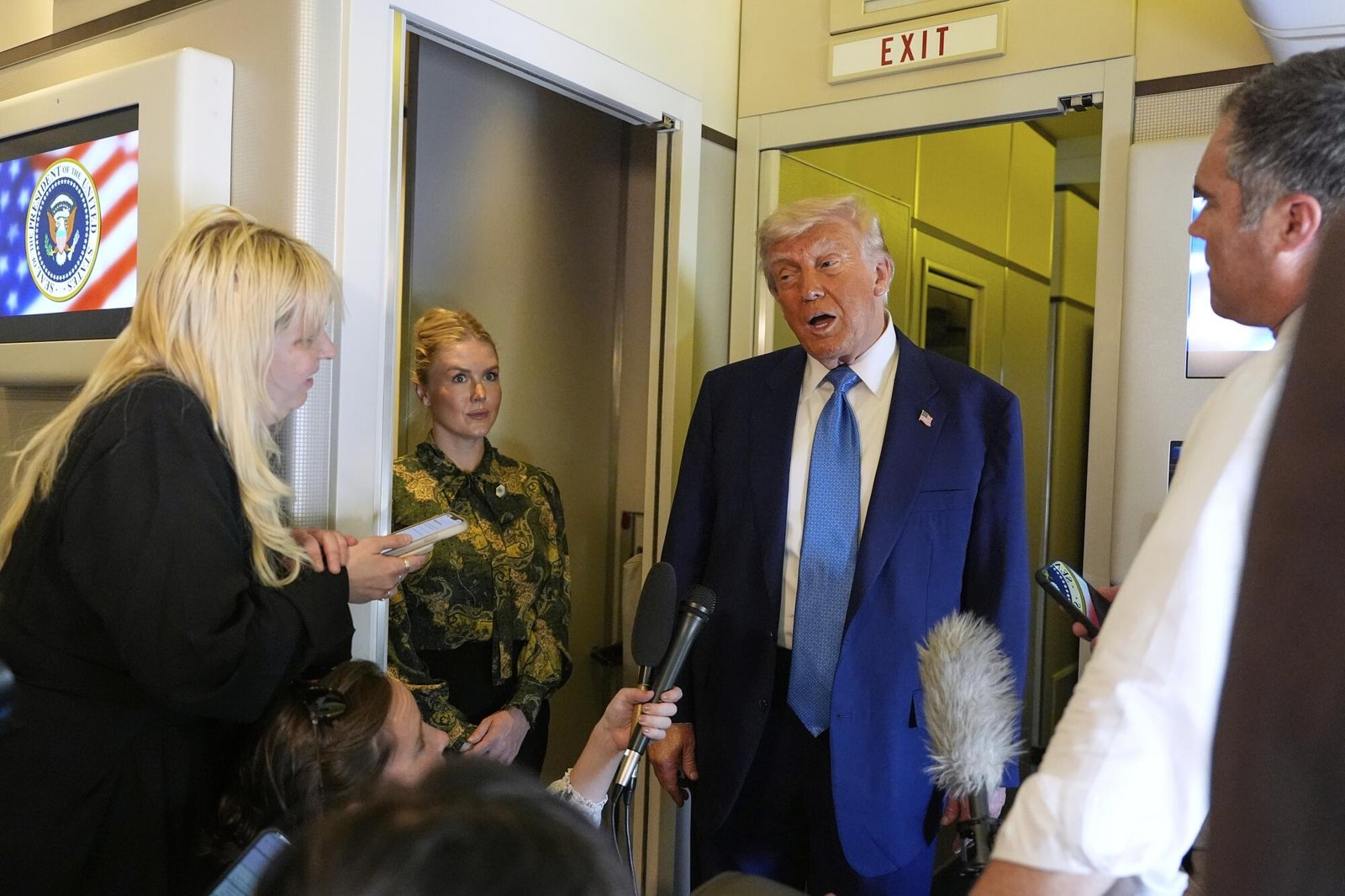 President Trump speaks on Air Force One to the media