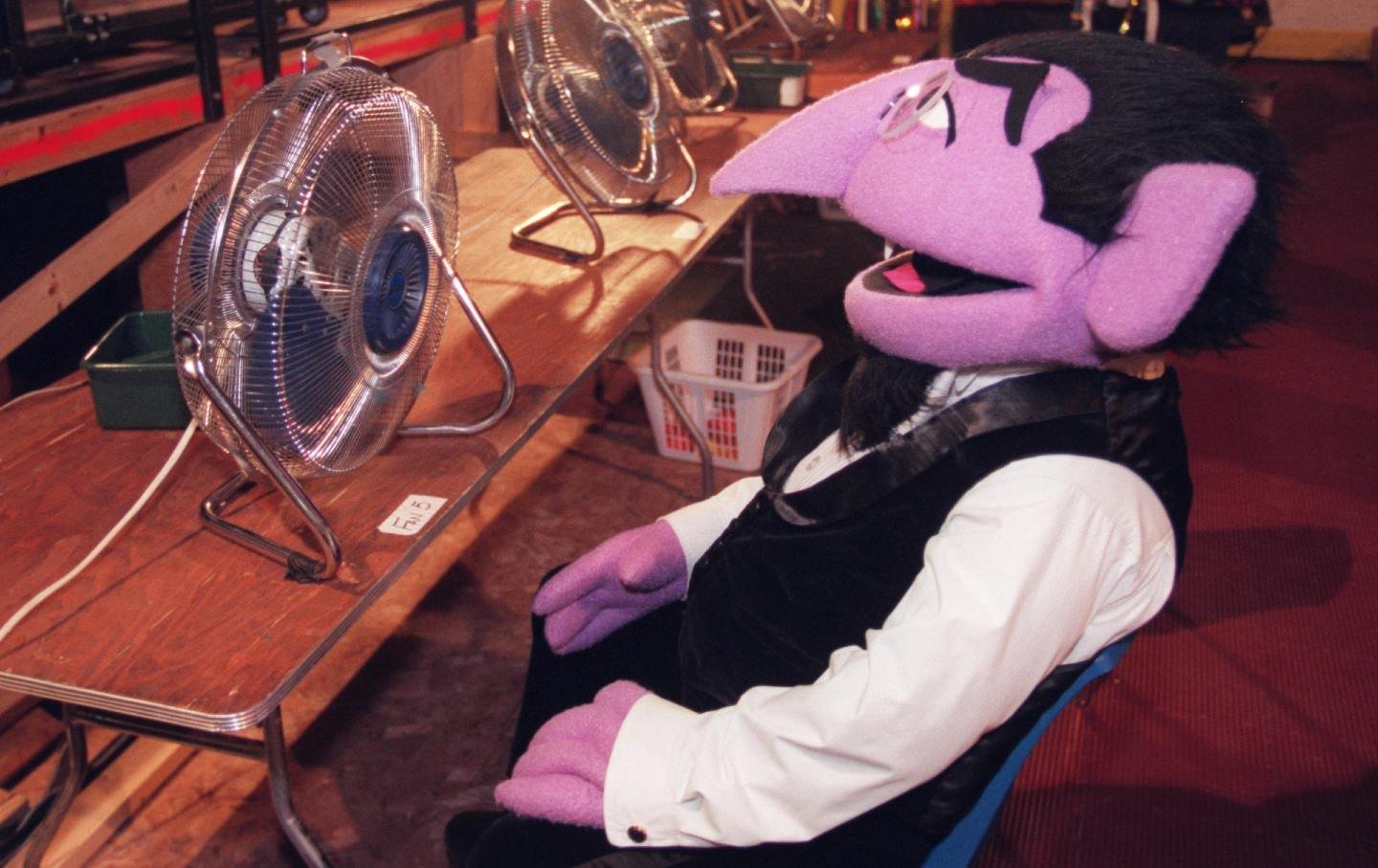 Count von Count tries to keep cool between performances during a Sesame Street live dress rehearsal.