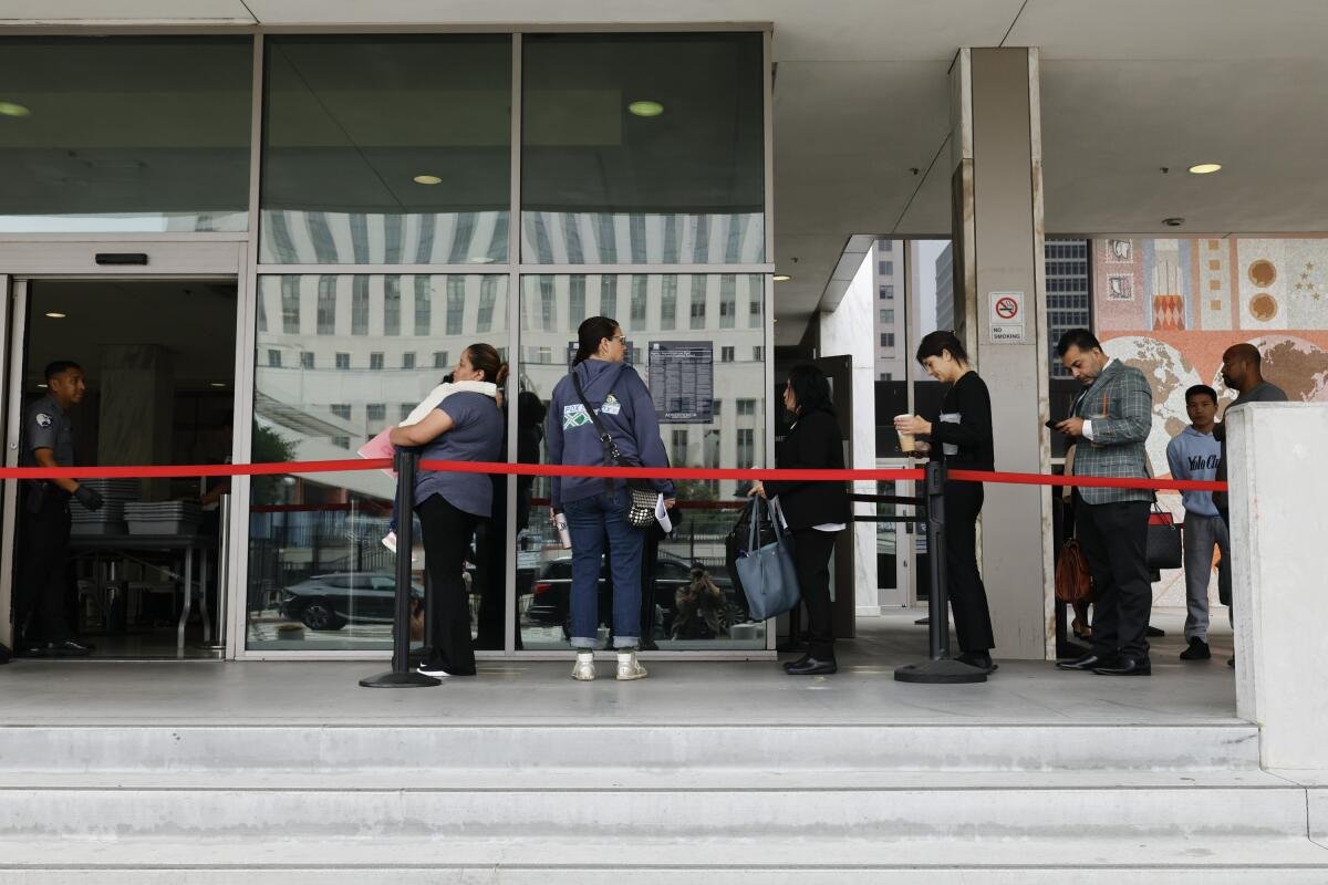 People line up outside the North Los Angeles Street Immigration Court