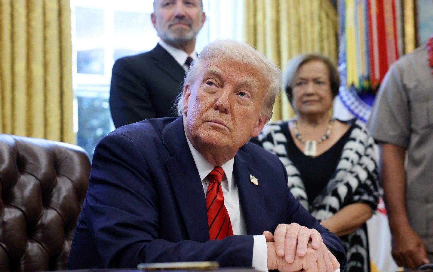 President Donald Trump speaks to reporters after signing a proclamation in the Oval Office at the White House on April 17, 2025, in Washington, DC.