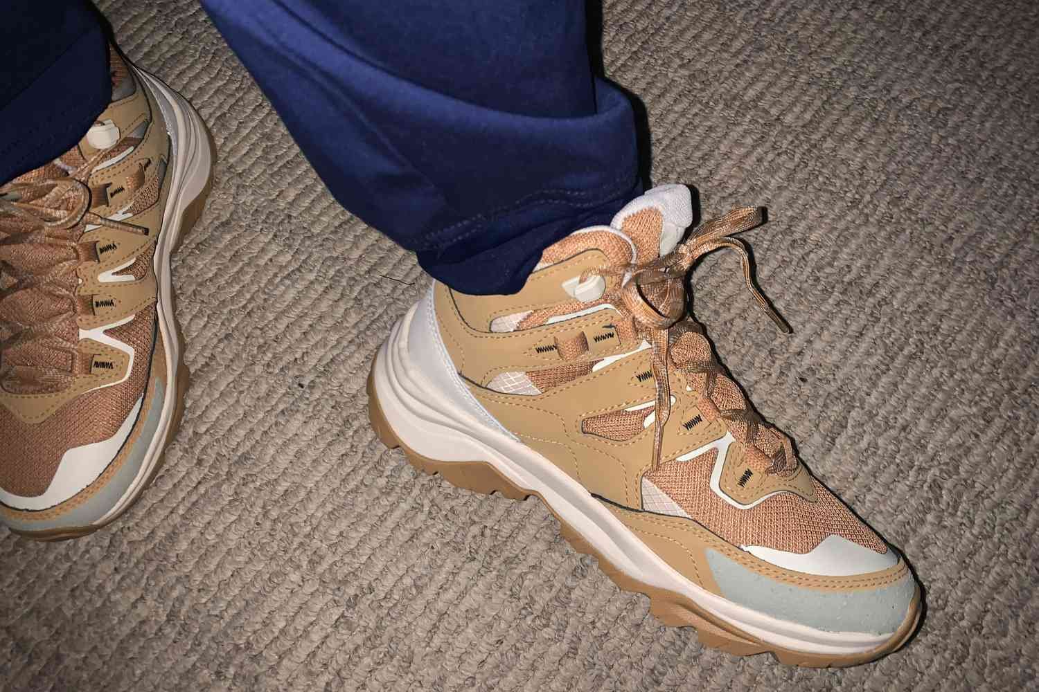 Close-up of feet wearing The North Face Women's Hedgehog 3 Mid Waterproof Boots