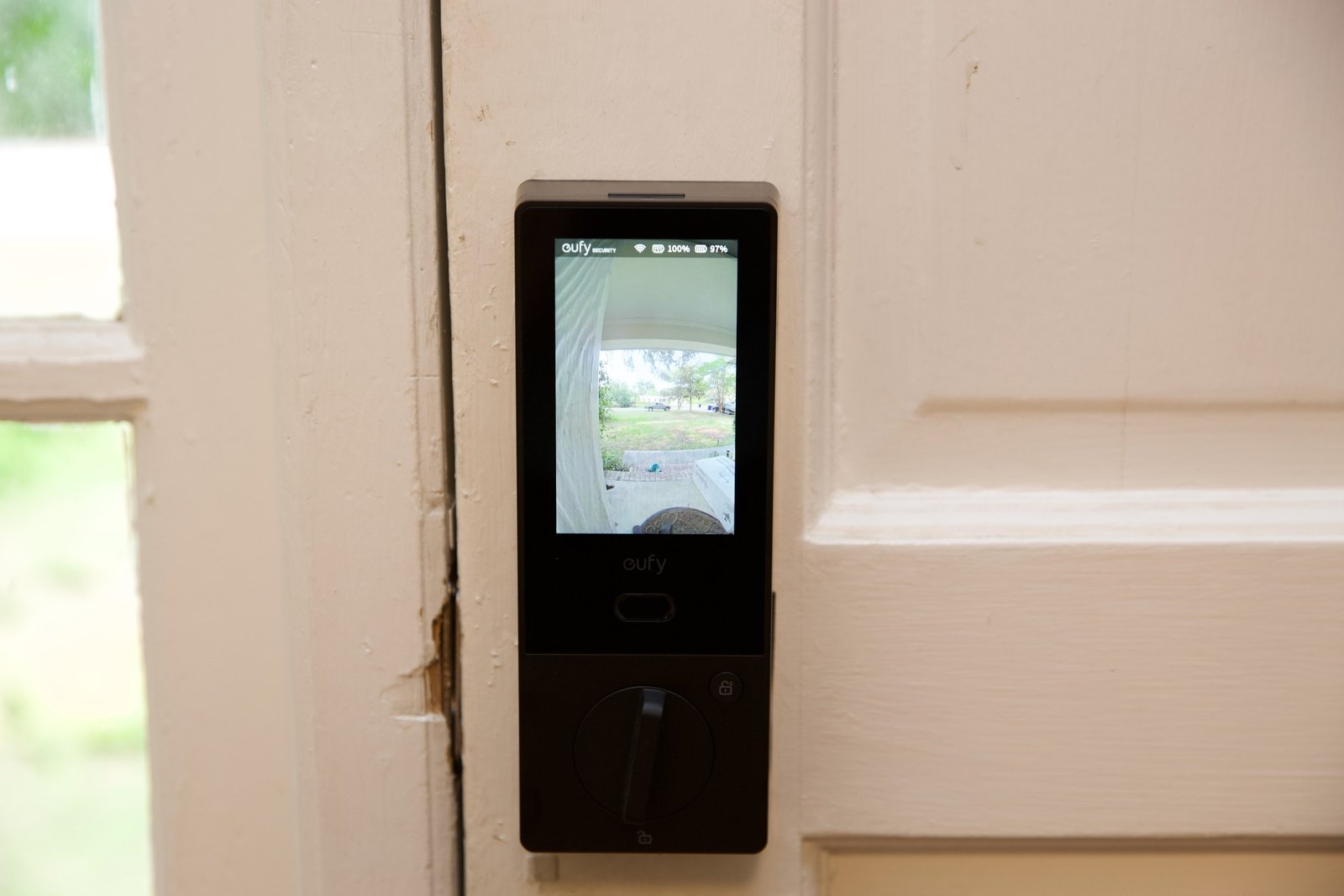 The rear of the lock is a screen that turns on when someone rings the doorbell and can be manually activated by a button on the back.