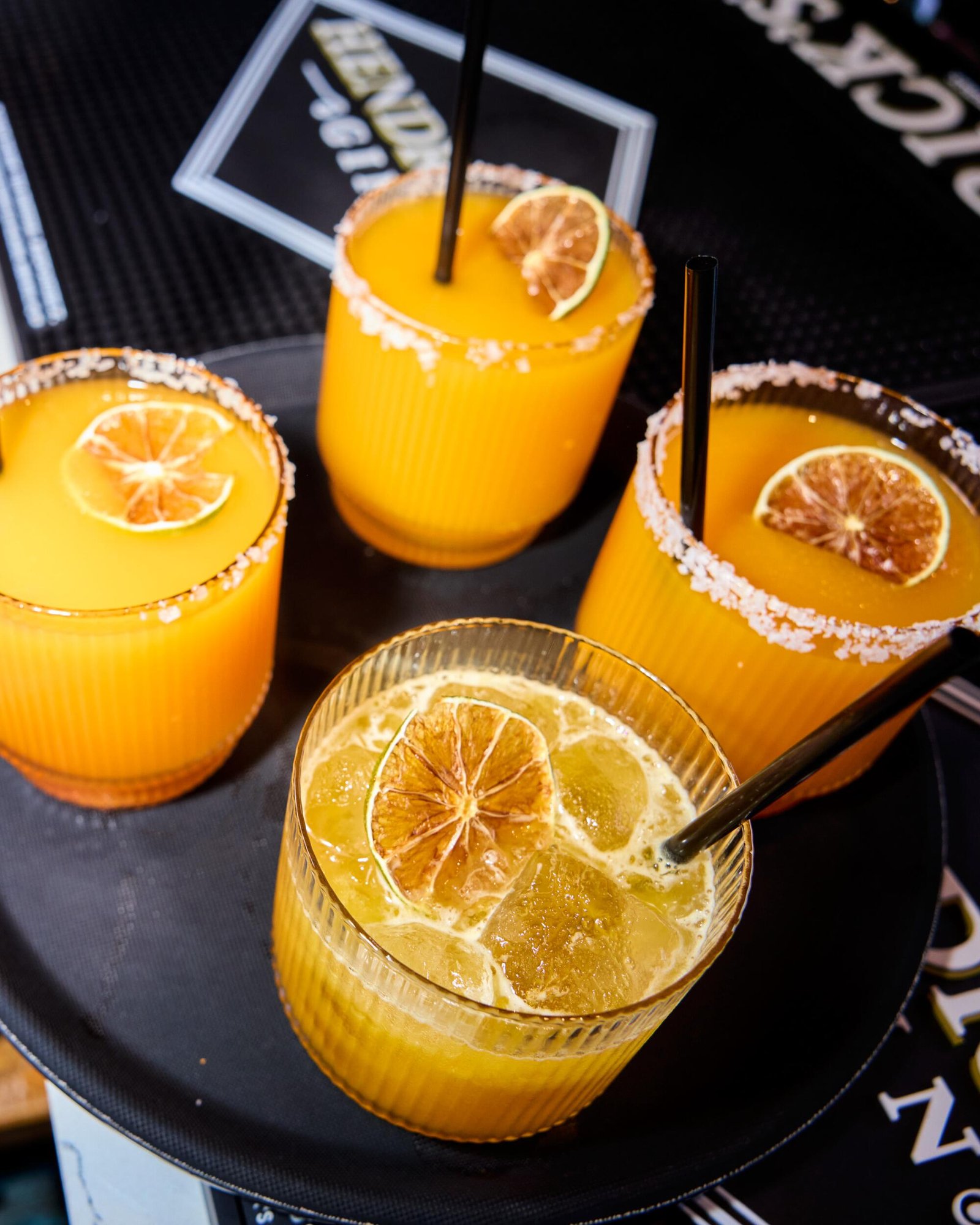 Four glasses of orange punch