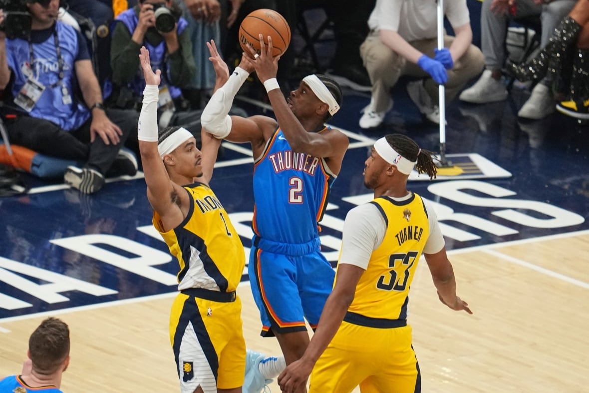 Three NBA male players.