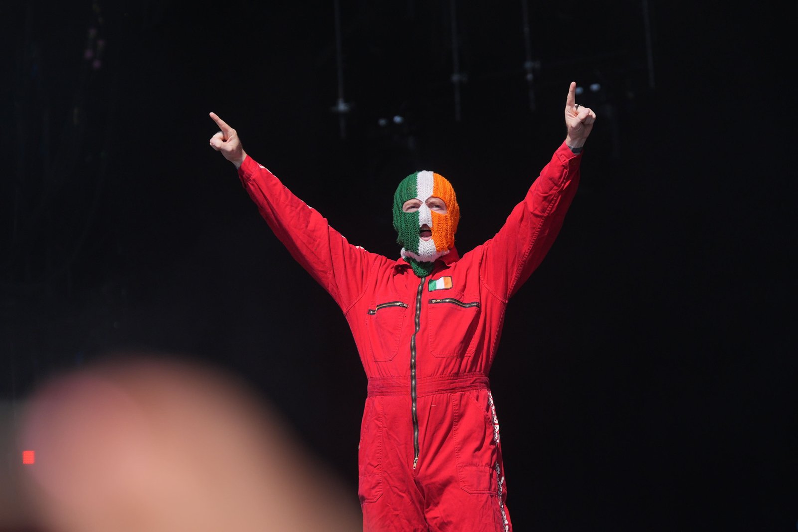 Kneecap performimg at Glastonbury (Yui Mok/PA)
