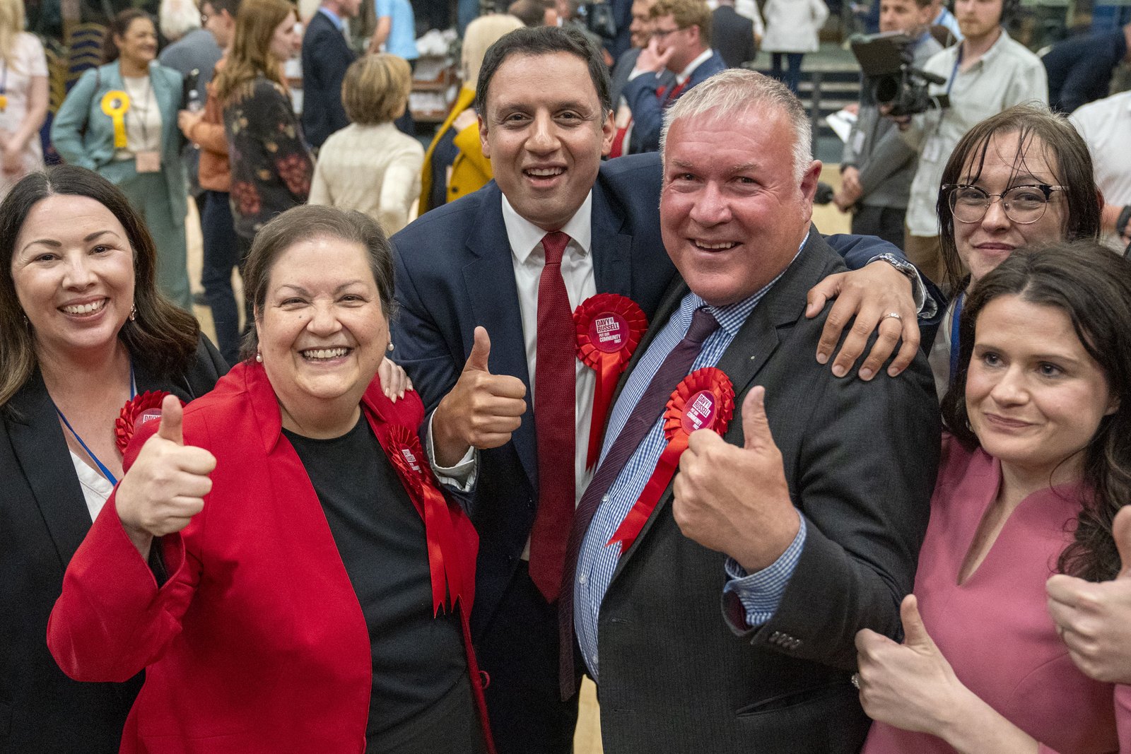 Davy Russell (centre, right) celebrates with Scottish Labour leader Anas Sarwar (centre) and deputy leader Jackie Baillie (left, centre)