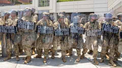 National Guard soldiers outside the Edward R. Roybal Federal Building