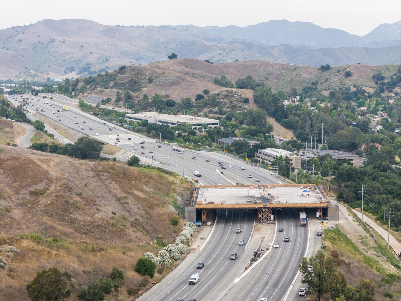The Wallis Annenberg Wildlife Crossing under construction over the 101 Freeway near Liberty Canyon Road in Agoura Hills.