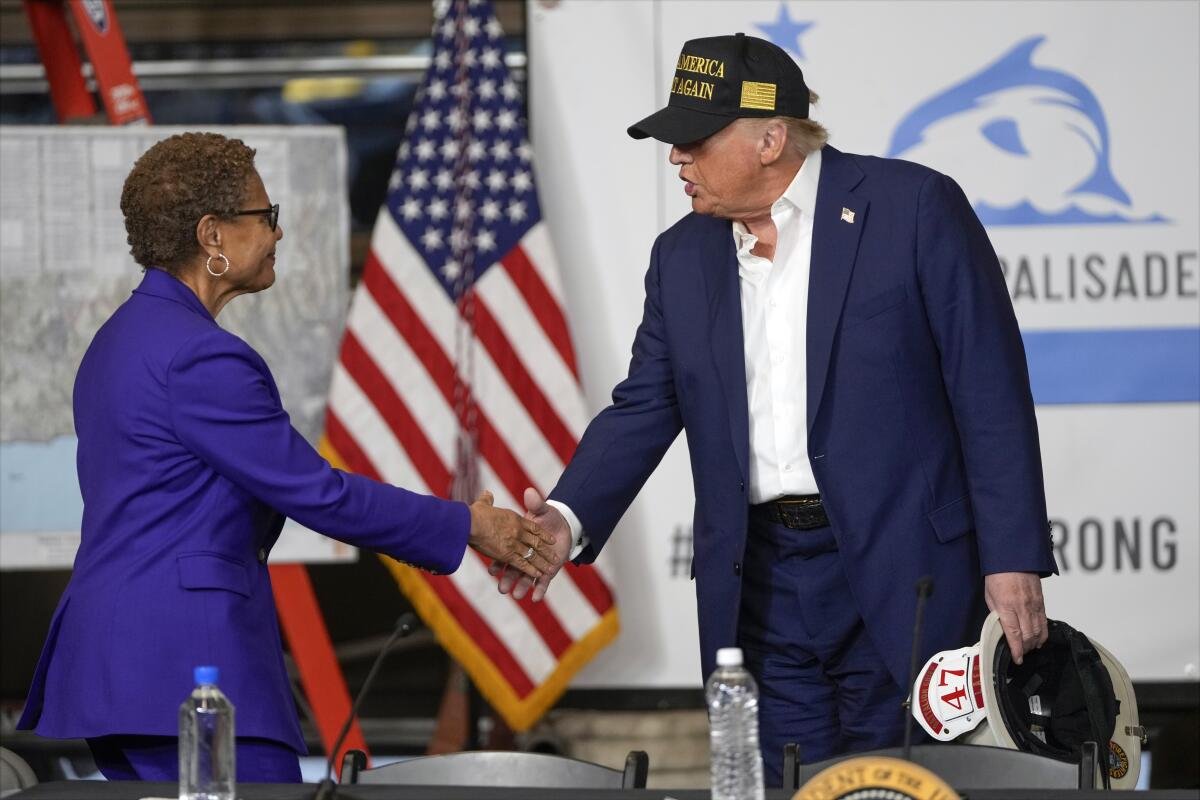 President Trump shakes hands with L.A. Mayor Karen Bass after a fire briefing in  on Jan. 24, 2025. 