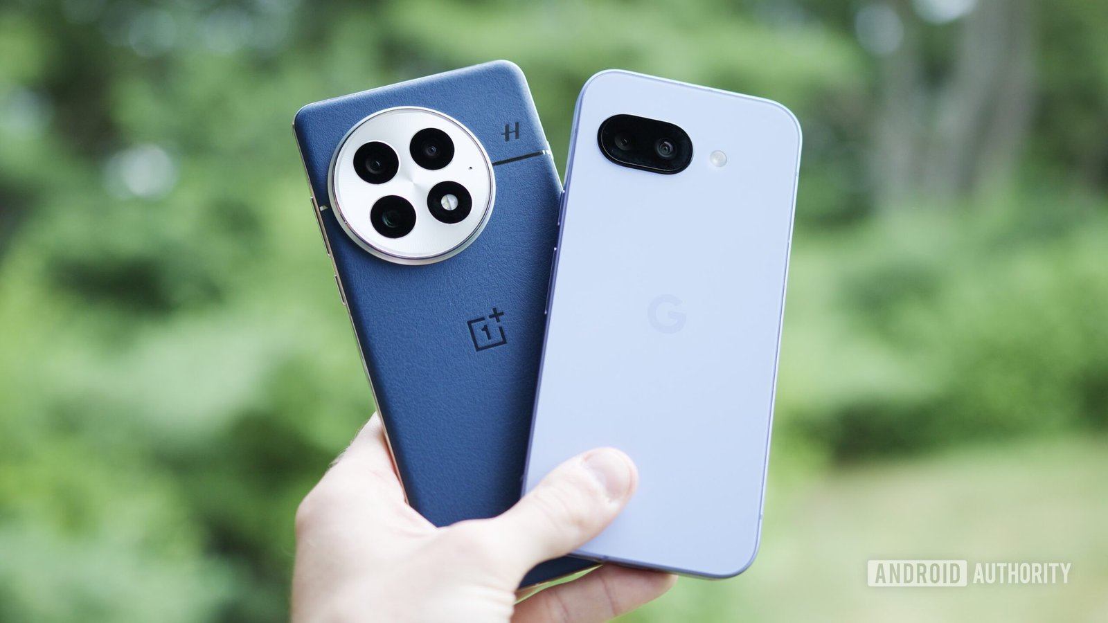 oneplus 13 google pixel 9a feature 1 Someone holding a OnePlus 13 and Google Pixel 9a next to each other.