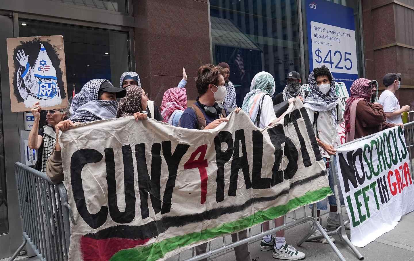 A group of pro-Palestinians holds a press conference and rally in front of the City University of New York.
