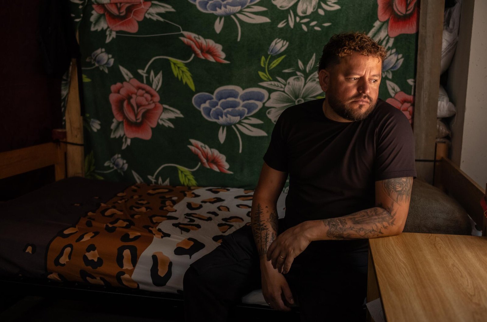 Richard Osorio poses for a portrait at Oasis del Migrante Shelter