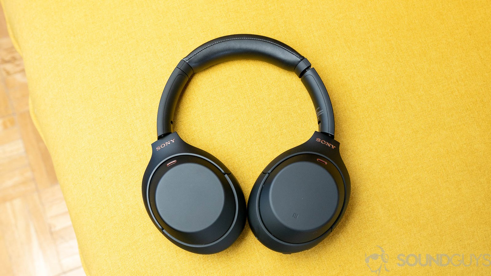 audio Sony WH 1000XM4 noise cancelling headphones full yellow backdrop The Sony WH-1000XM4 noise cancelling headphones full yellow backdrop.