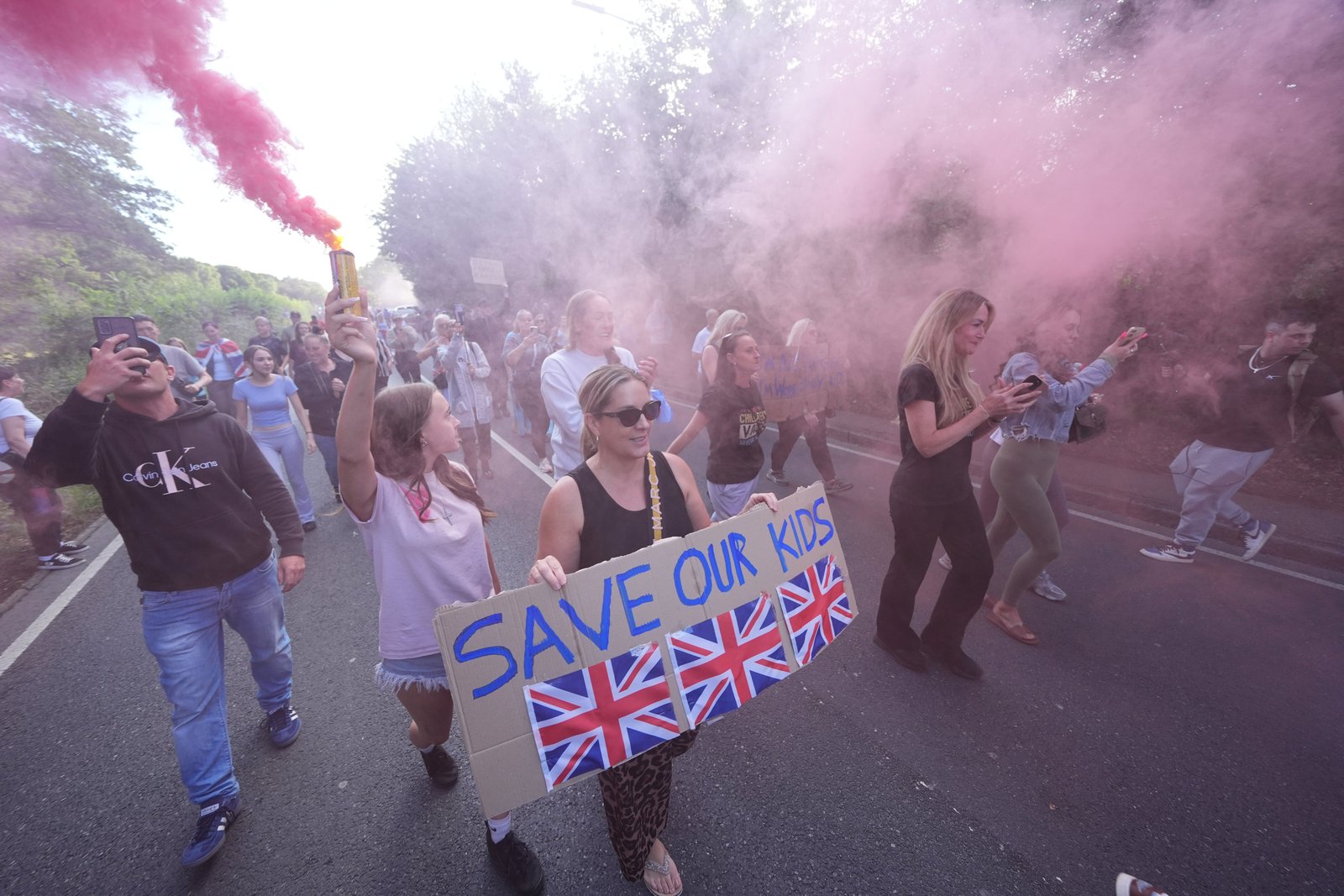 Protesters near the Bell Hotel in Epping, Essex