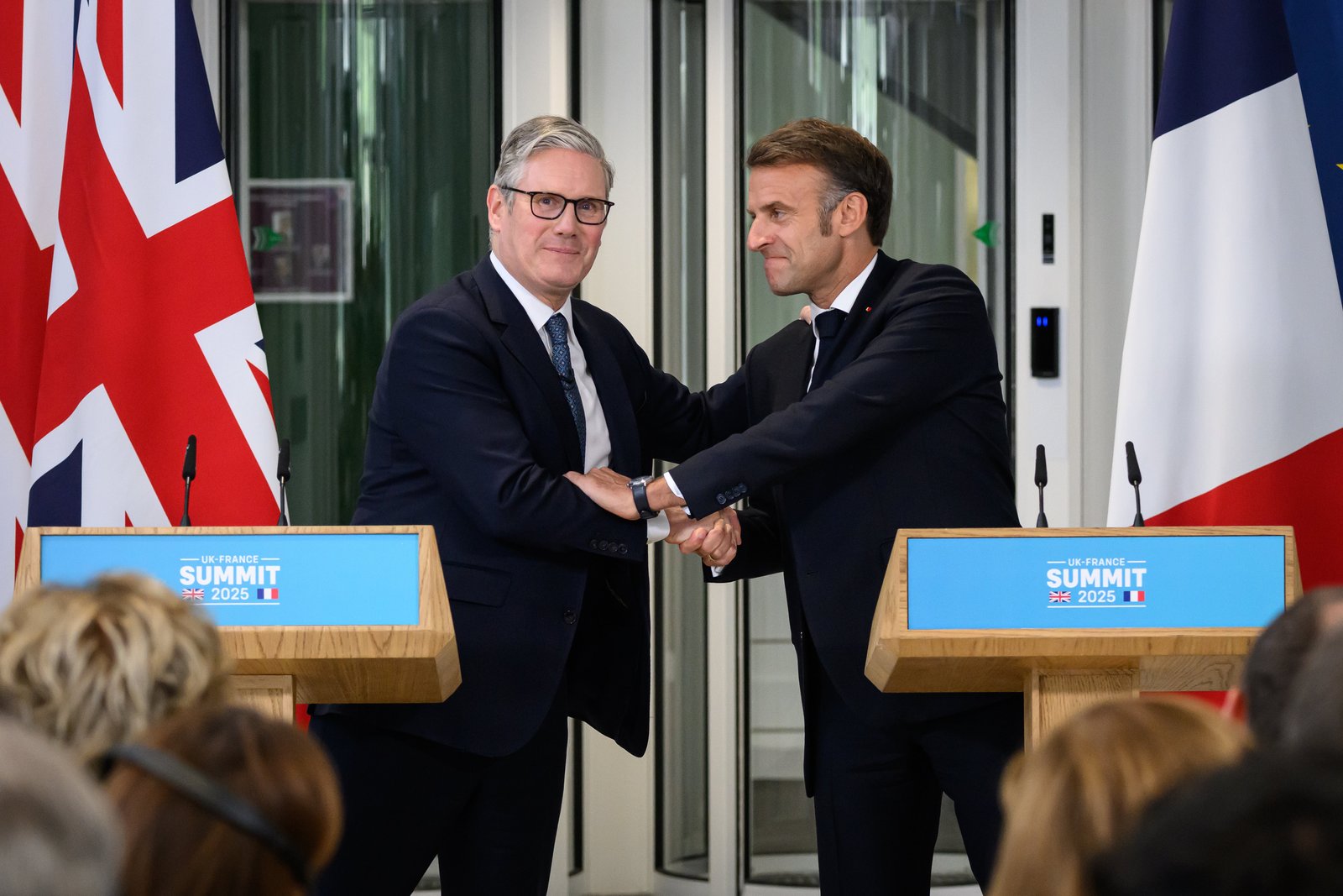 Prime Minister Sir Keir Starmer and French President Emmanuel Macron set out details of the one in, one out migrant deal (Leon Neal/PA)