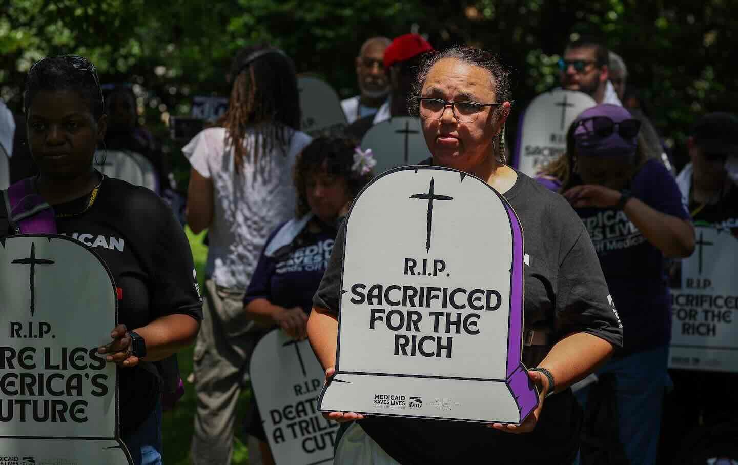 Care workers with the Service Employees International Union (SEIU) participate in a living cemetery protest at the US Capitol on June 23 in Washington, DC.