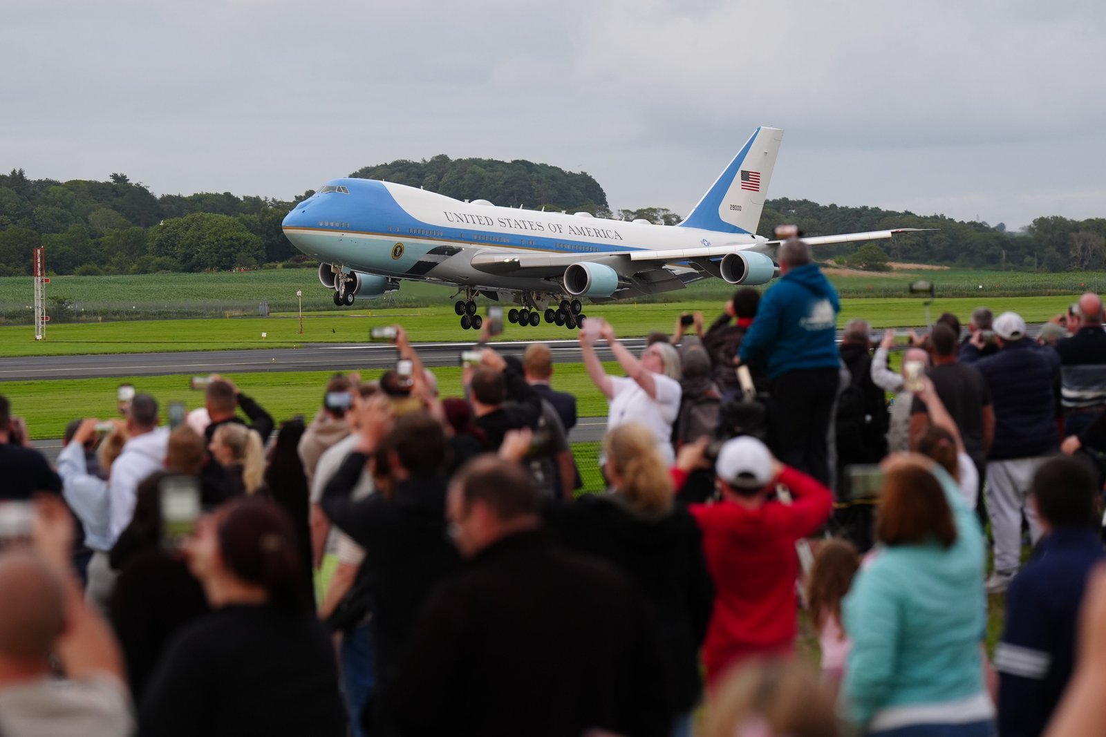 Crowds watch as Donald Trump lands at Prestwick airport
