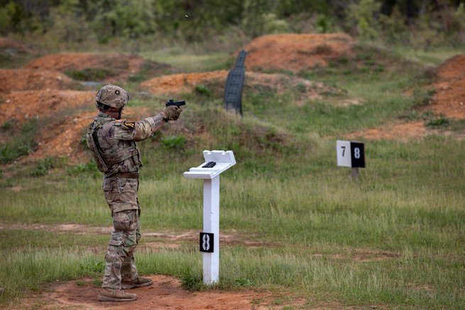 Cpt. Matthew Haas shoots at moving targets 