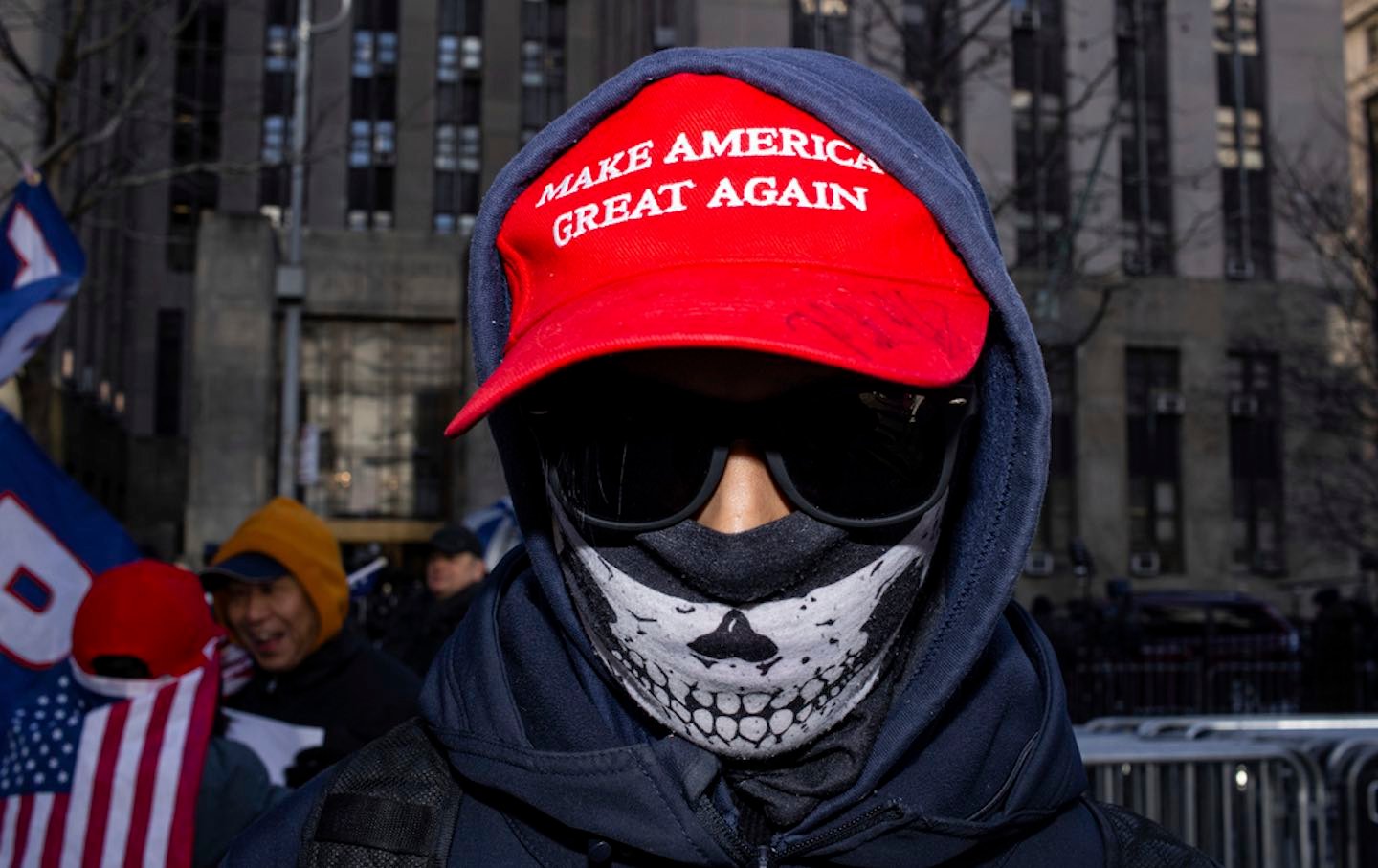 A pro-Trump protester outside the Manhattan Criminal Courthouse, where Trump was given an unconditional discharge in January 2025.