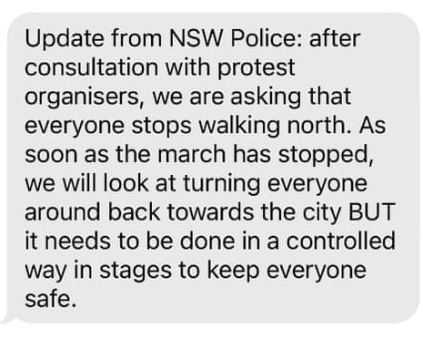 Screenshot of a message from NSW Police to protesters walking across the Sydney Harbour Bridge on 3 Aug 2025 to stop walking north, turn around and walk back to CBD