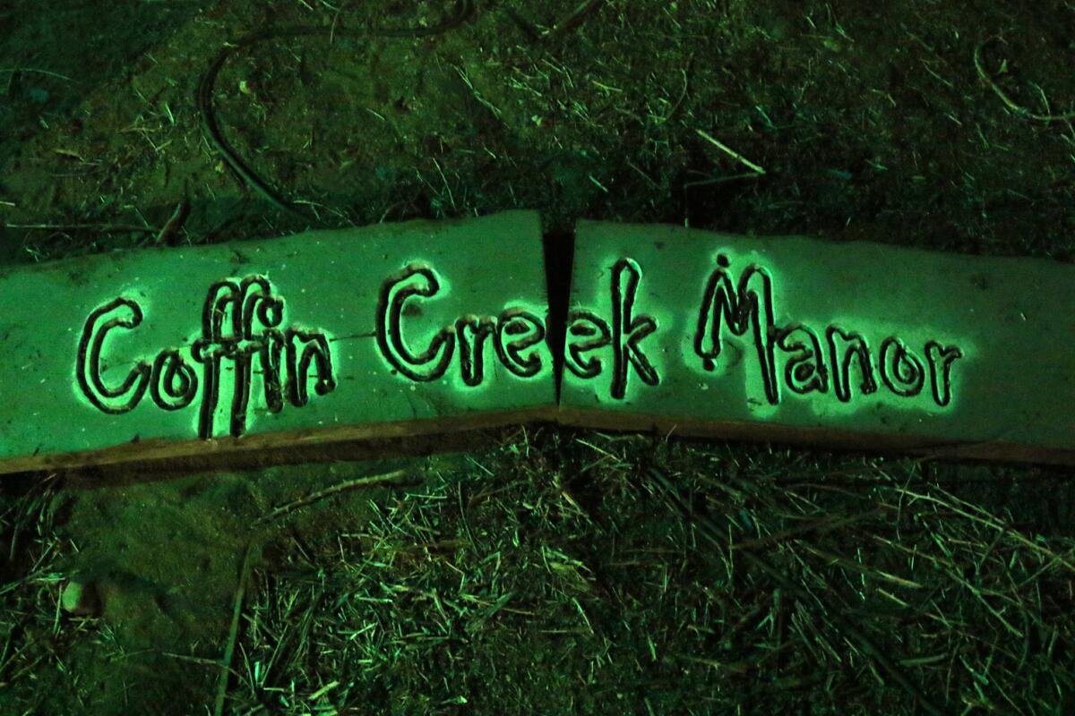 The sign for the Coffin Creek Manor maze.