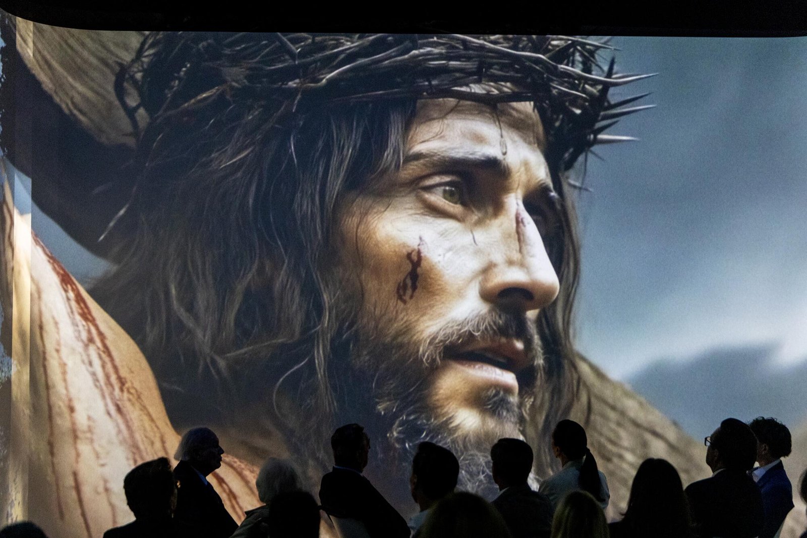 Patrons attend the opening of "The Shroud of Turin: An Immersive Experience." 