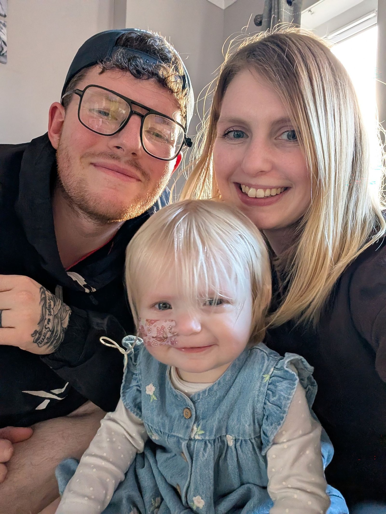 Yasmin Whittington with her husband Charles and their daughter Elyza, who suffers from an unknown condition that causes sickness, poor feeding, low muscle tone and chronic fatigue